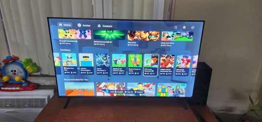 TCl tv with rotatble table
