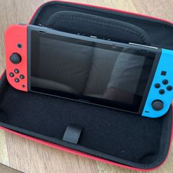 Nintendo Switch w/ 4 games & case 