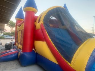 Jolly Jumper Bounce house with water slide