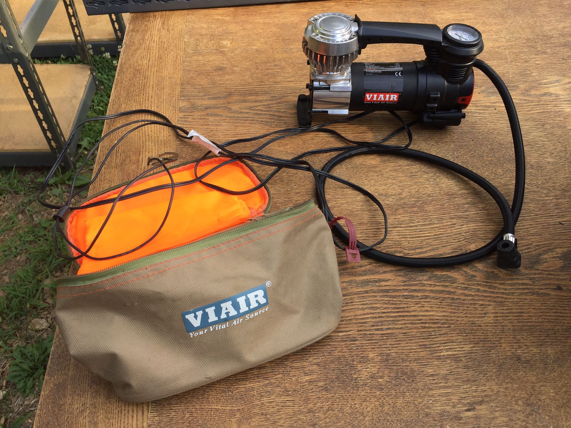 Orange and Black ViAir 8P4 12V Portable Compressor with original bag and cord. Great condition.
