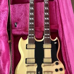 1990 Gibson EDS-1275 Doubleneck Electric Guitar. All original. Both necks are straight and the action is low. Plays and sounds great! If you look at t