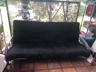 New futon with 6 inch mattress, mattress topper also included: $ 75.00