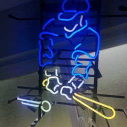 Neon light/sign of a baseball player.
