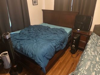 Solid oak queen bed frame excellent condition with optional matching night stand