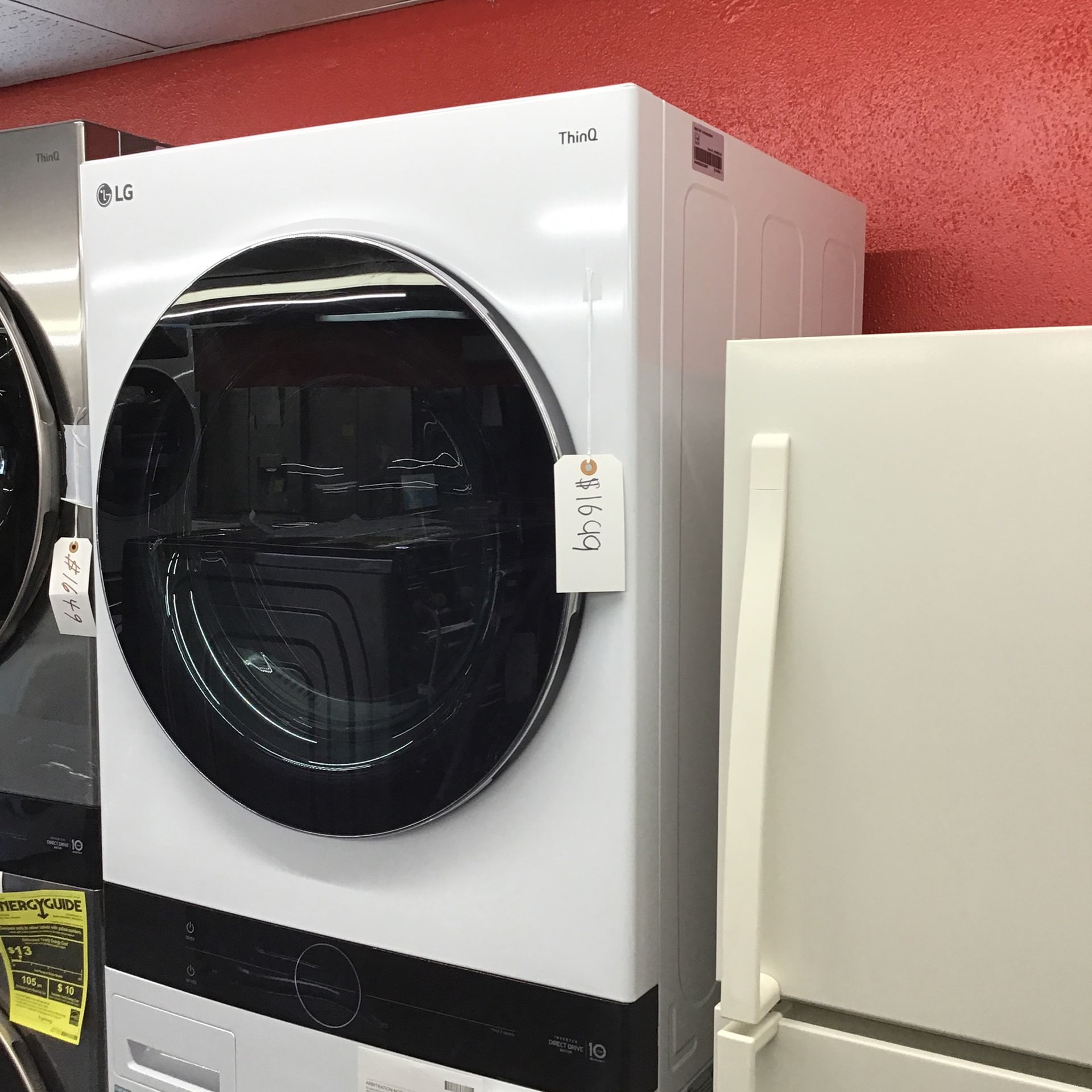 New Scratch And Dent LG Front Load Washer And Dryer Stackable Full Size Unit. 1 year Warranty 