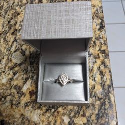 1 CT. T.W. Composite Pear Diamond Frame Twist Shank Engagement Ring in 10K White Gold