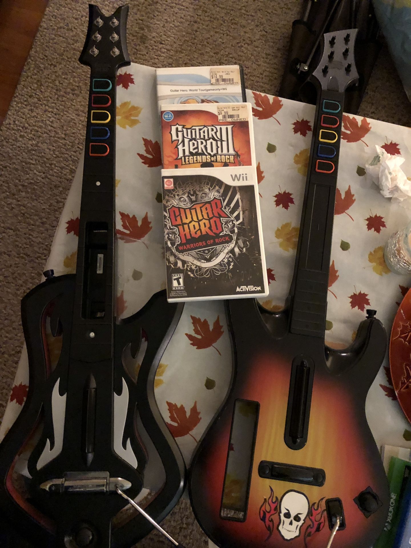 Guitar Hero guitars and 3 Guitar Hero Games