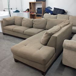 Brown l-shaped sectional couch
