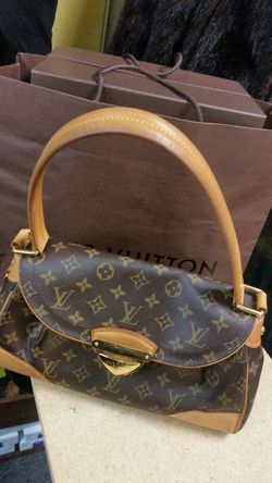 Authentic. Loui. Purse.