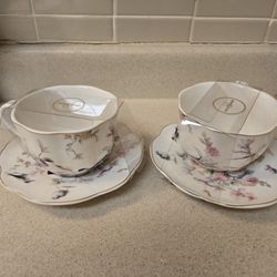 Set of 2 tea cups; NOTE: If it's posted; it's available.  