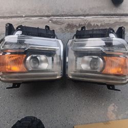 FACTORY OEM GMC HEADLIGHT ASSEMBLY WITH BULBS CHEAP 