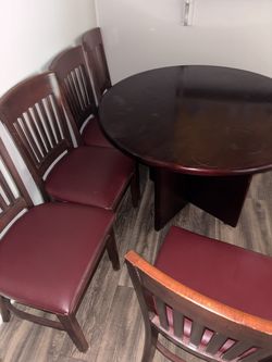Real wood round table with five chairs