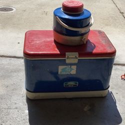 Antique ice chest with thermos