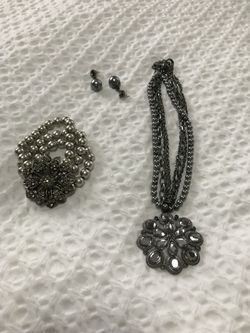Necklace earrings and bracelet . Retail price for all $148