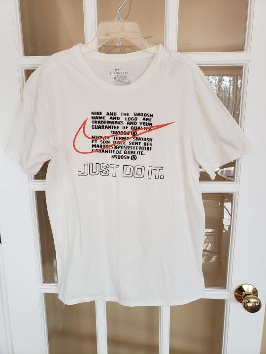 Nike White Tee with Orange Swoosh and Black Text Size: L