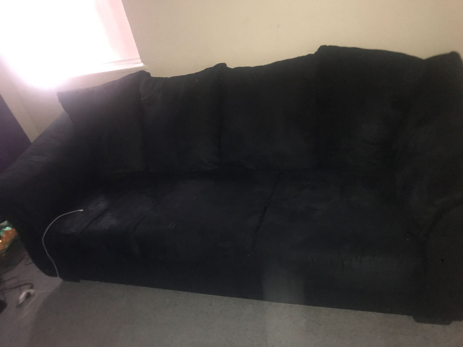 Black sofa and love seat living room set