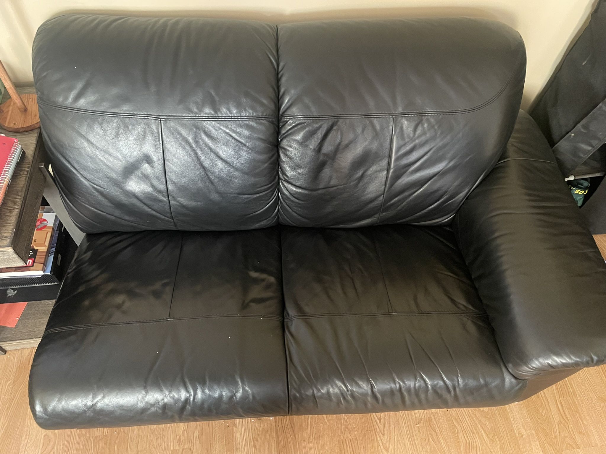 half of a black couch