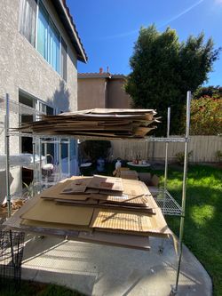 Large Lot of Flattened Cardboard Boxes