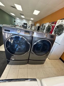 Samsung blue 30” each washer and dryer set front load great condition comes with warranty