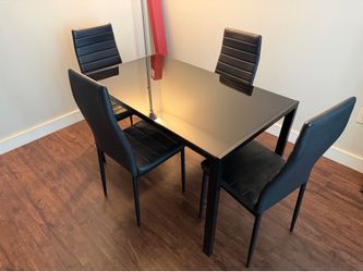 Black glass dining table