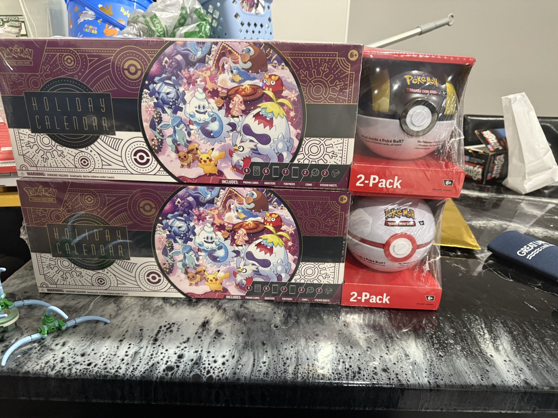 Pokemon TCG 2025 Holiday Calendar and Poke Ball Pokemon Center Exclusive