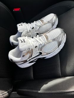 Nike P-6000 in the "White/Metallic Silver/Black