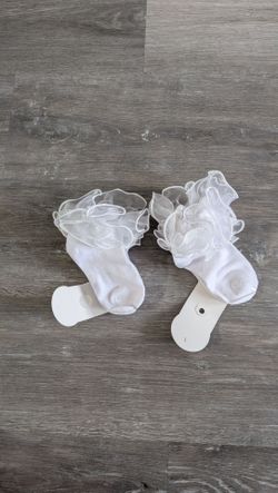 Two pair of ruffled toddler socks