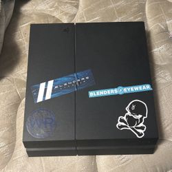 PS4 with 2 Controllers & Games