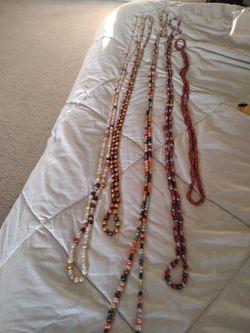 Real pearl necklaces 5 total . Long strands