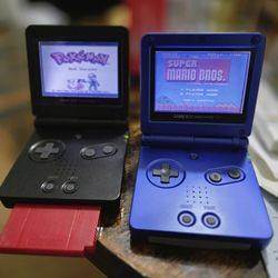 2 Nintendo Game Boy Advance SP Black And Blue
