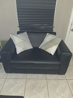 Black leather sofa live seat and recliner