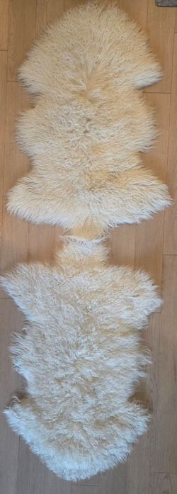 Genuine World Market Mongolian sheepskin rugs (2). 20x35
