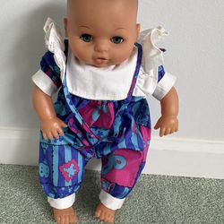 Vintage 1993 style Lissi Puppe baby doll with distinct sleepy eyes that open and close