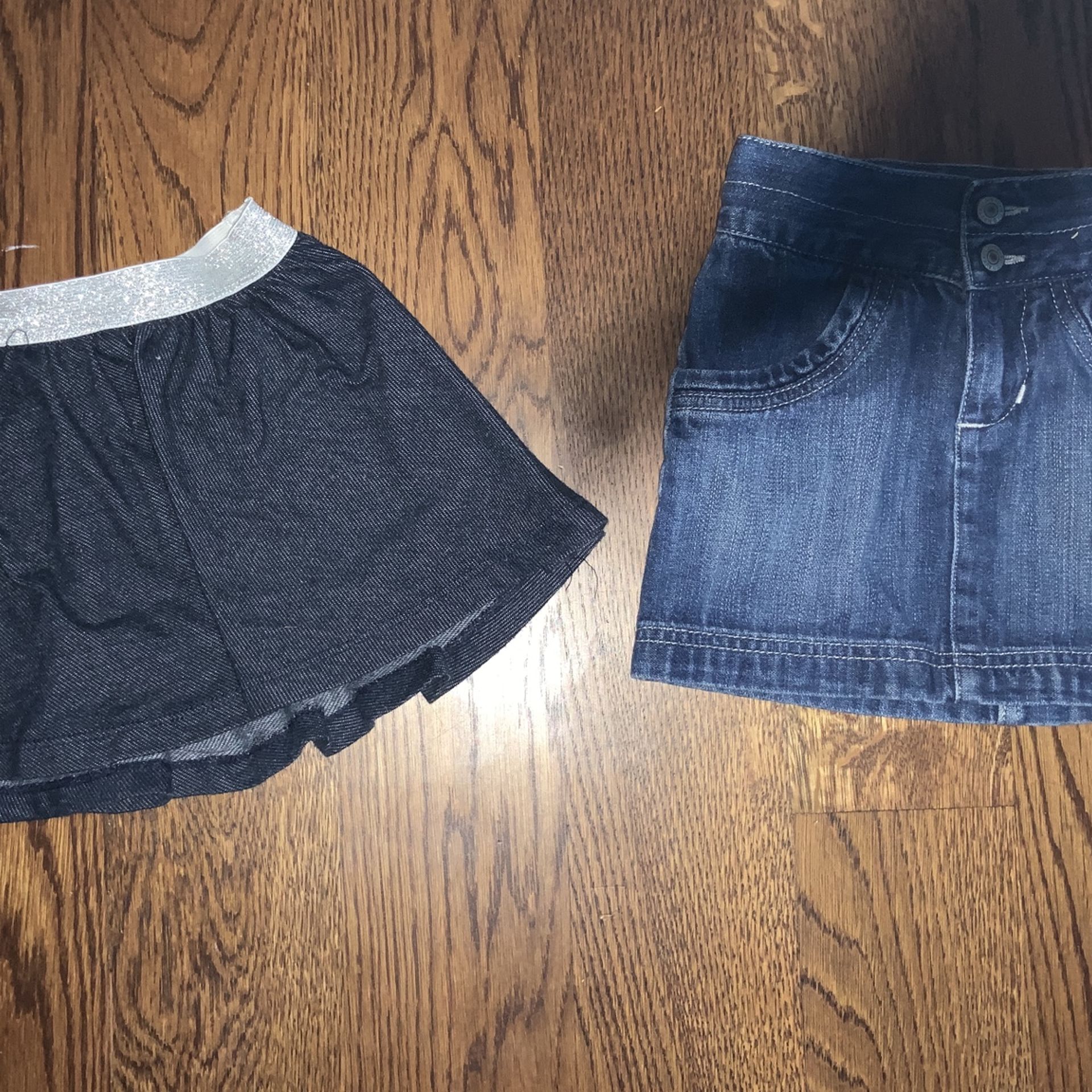 Two 4-year old skirts