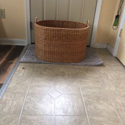 Large wicker, laundry, basket for sale.