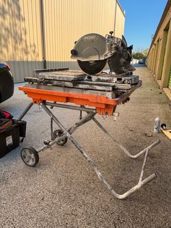 RIDGID 10-inch Wet Tile Saw with a rolling stand