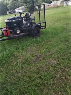 Trailer And Mower