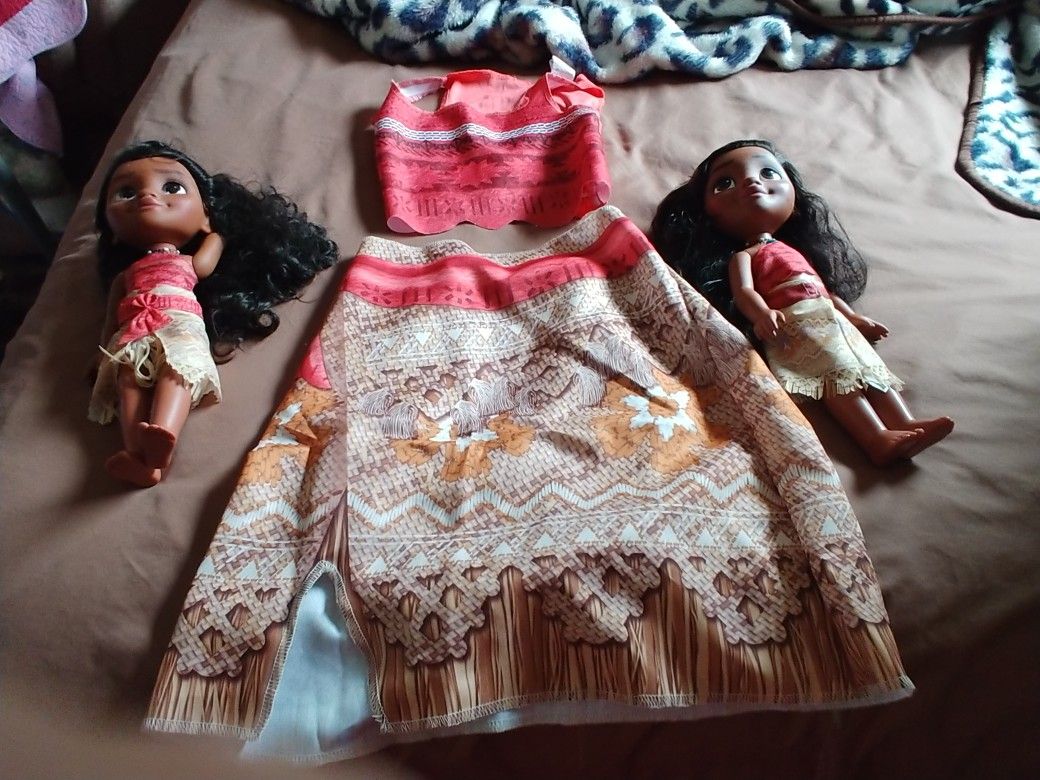 2two Moana dolls. And A Outfits 