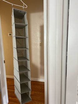 Used hat rack hanging storage, 13”x7”x54”; size: 8 section,;