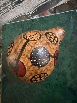 Beautiful African Hand Painted Carved Gourd Circle Design Polka Dot Hand-painted decorative gourd is made from a natural dried gourd. It has a brown