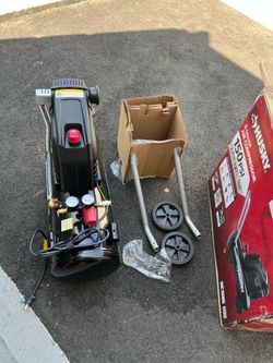 Husky 8 Gallon 150 PSI Portable Electric Oil-Free Air Compressor with rubber wheels and quick coupler.