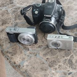 Camaras Para Fotos  No Traen Cargador Canon Lumix   La Grande Es Canon Sx50hs