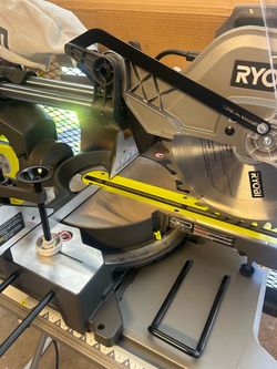$175$. 15 Amp 12 in. Corded Sliding Compound Miter Saw with LED Cutline Indicator