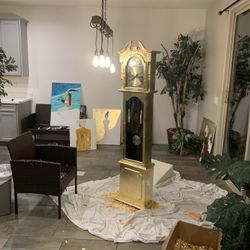 Gold grandfather clock