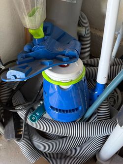 $50 Pool pump, vacuum and hoses