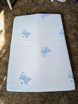 Fold pack n play mattress topper