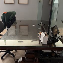 Glass dining table . Best offer takes it ( dark  brown )