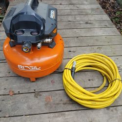 RIDGID 6-Gallon Pancake Air Compressor (Model OF60150HB)