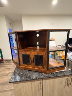 Entertainment stand with tv hanging stand