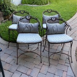 4 Iron Chairs With Cushions